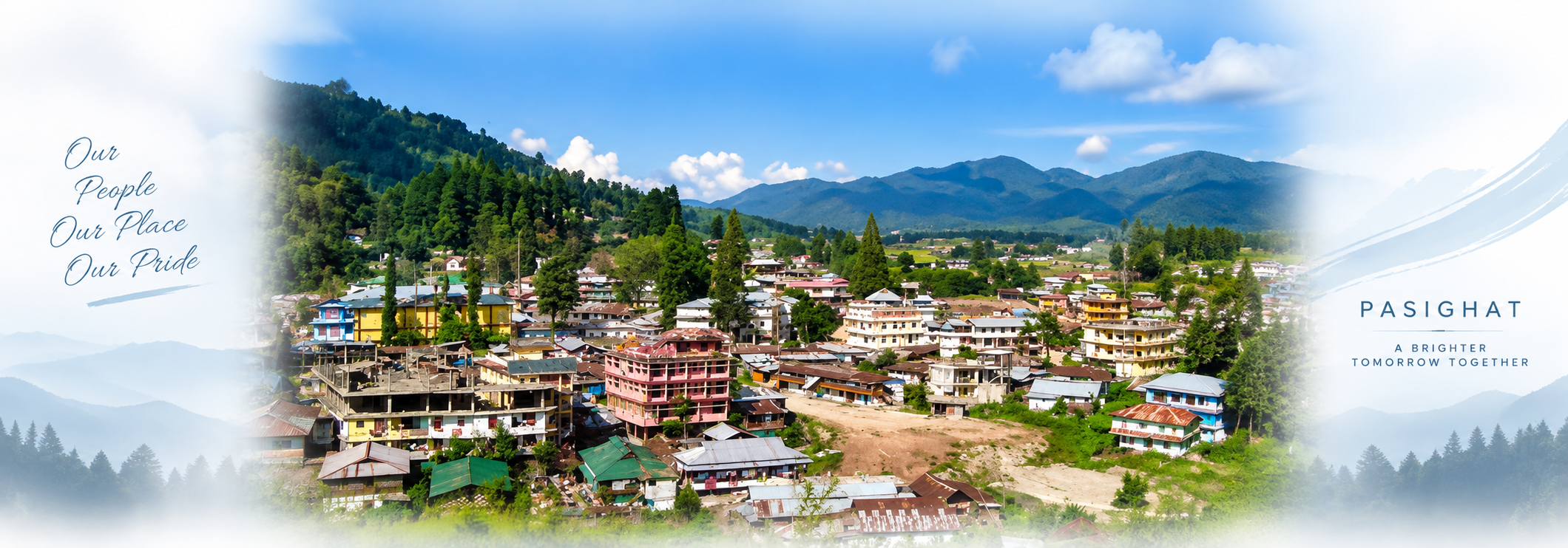Hillside view of Pasighat town with colourful multi-storey buildings and tin-roofed houses spread across a green forested slope below mountains under a blue sky